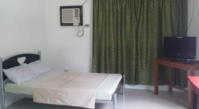 <b class="font-bara"><i class="bi bi-geo-fill h4"></i> Mariner's Place</b> <br/>Mariner’s Place and Resort is the perfect place for relaxation and celebration. It features standard guest rooms, 24-hour security, a parking space, and a function hall. Guests have direct to access to the beach.